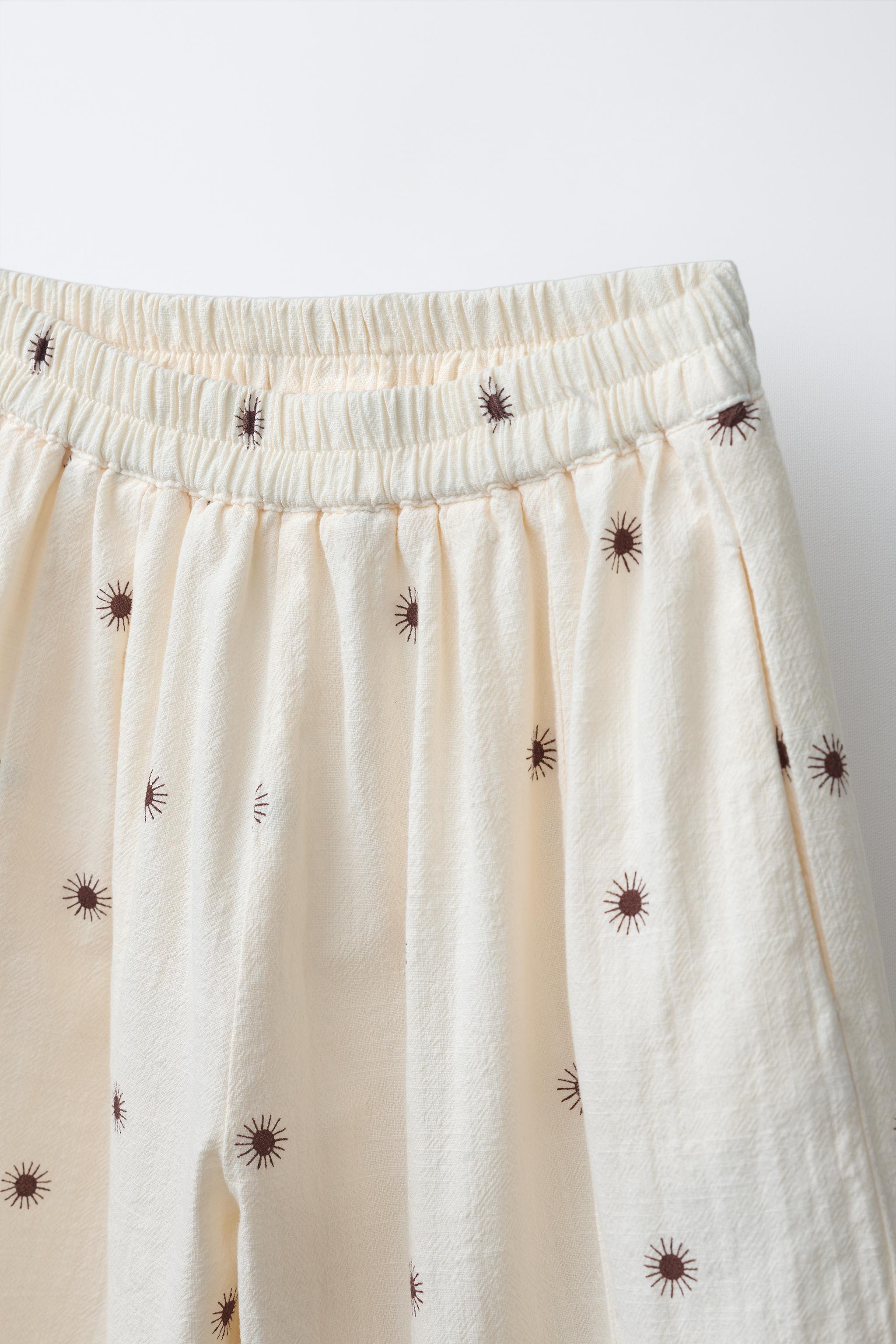 TEXTURED SUN PRINT BAGGY PANTS